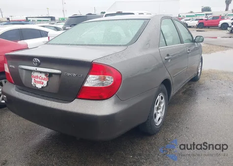 2004 Toyota Camry Le z USA, uszkodzony, nr VIN 4T1BE32K24U789868